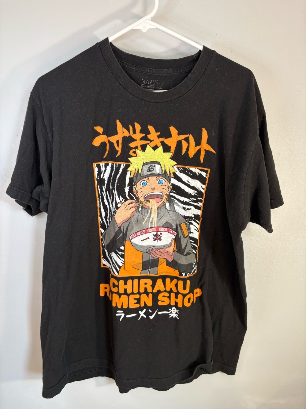 Spencer's Black Naruto Ichiraku Ramen Graphic Tee with Orange Accents